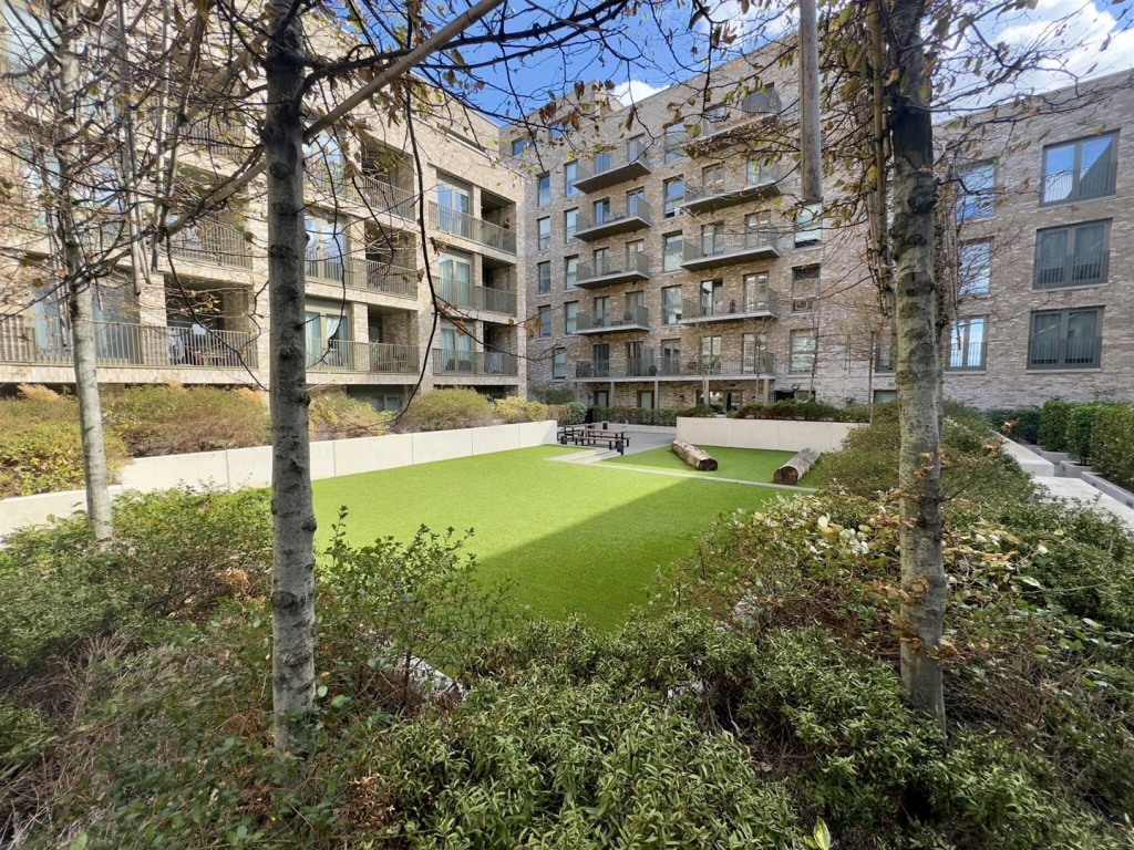 a photo of a block of apartments in london