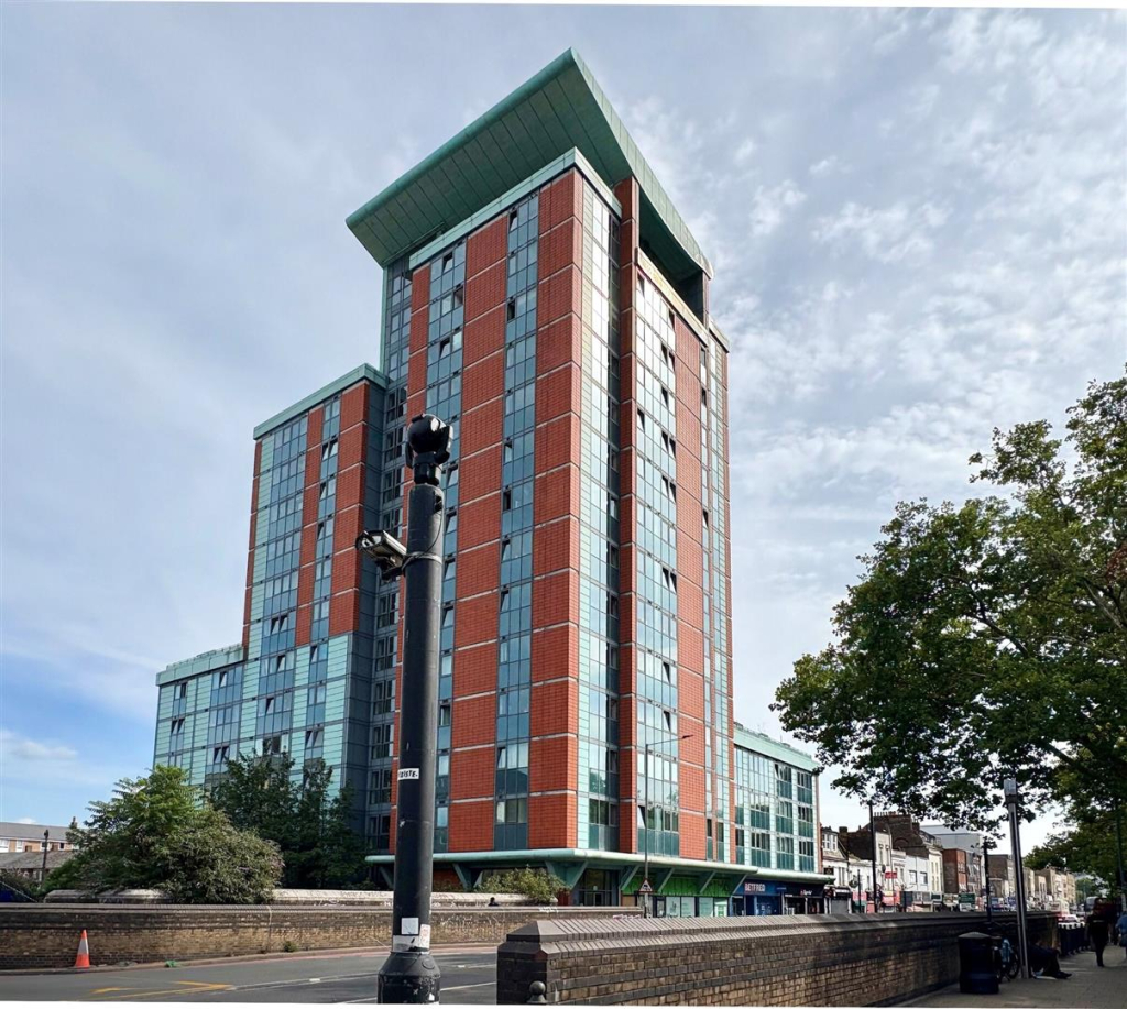 Modern high-rise red and green apartment building
